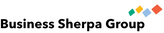 Business Sherpa Group logo featuring the company name in a bold, black sans-serif font. To the top right of the text, four colored diamond shapes (green, yellow, light blue, and orange) tilt to the right, ascending in size from left to right.